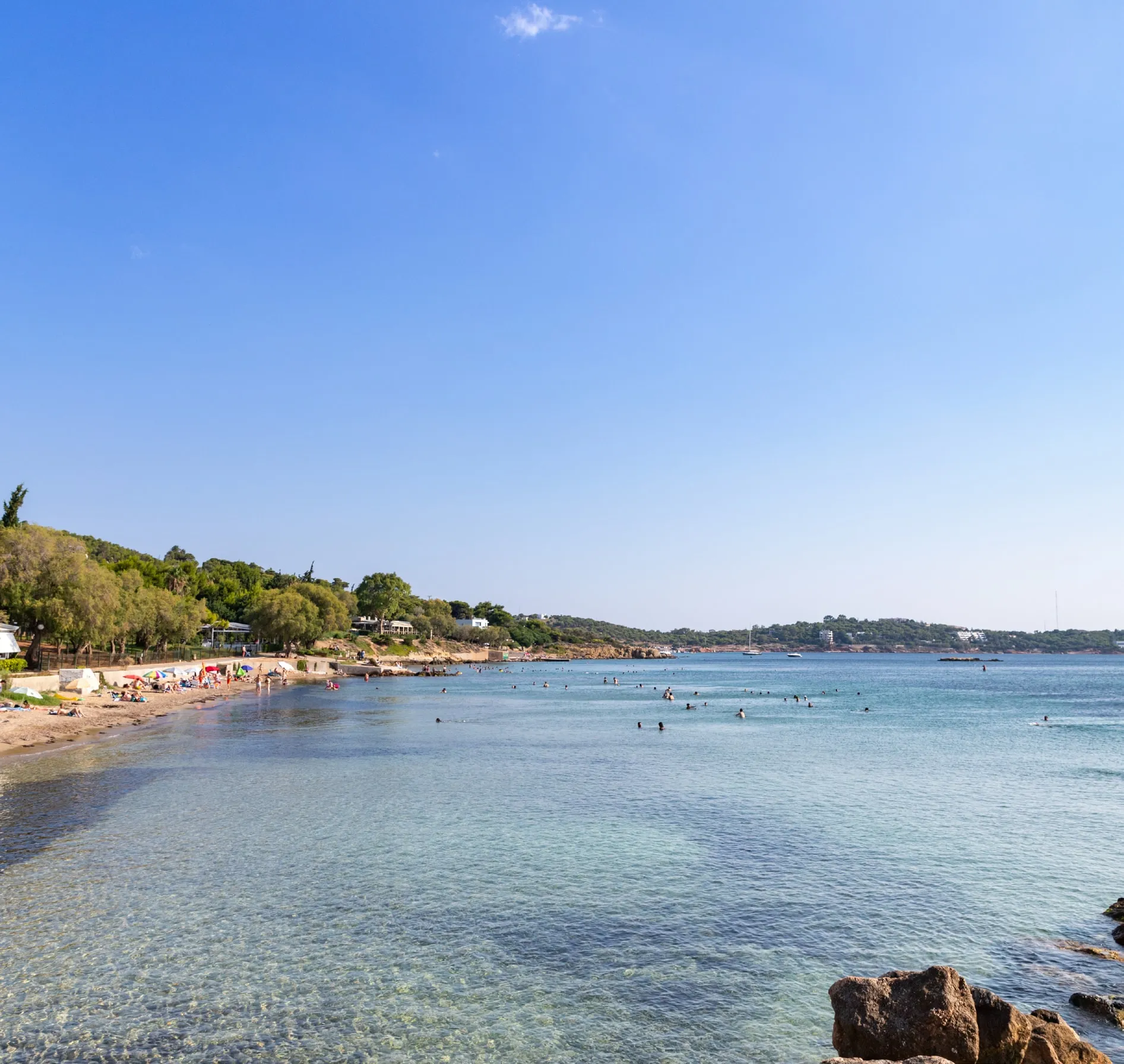 A cove of clear water on the Vouliagmeni coast
