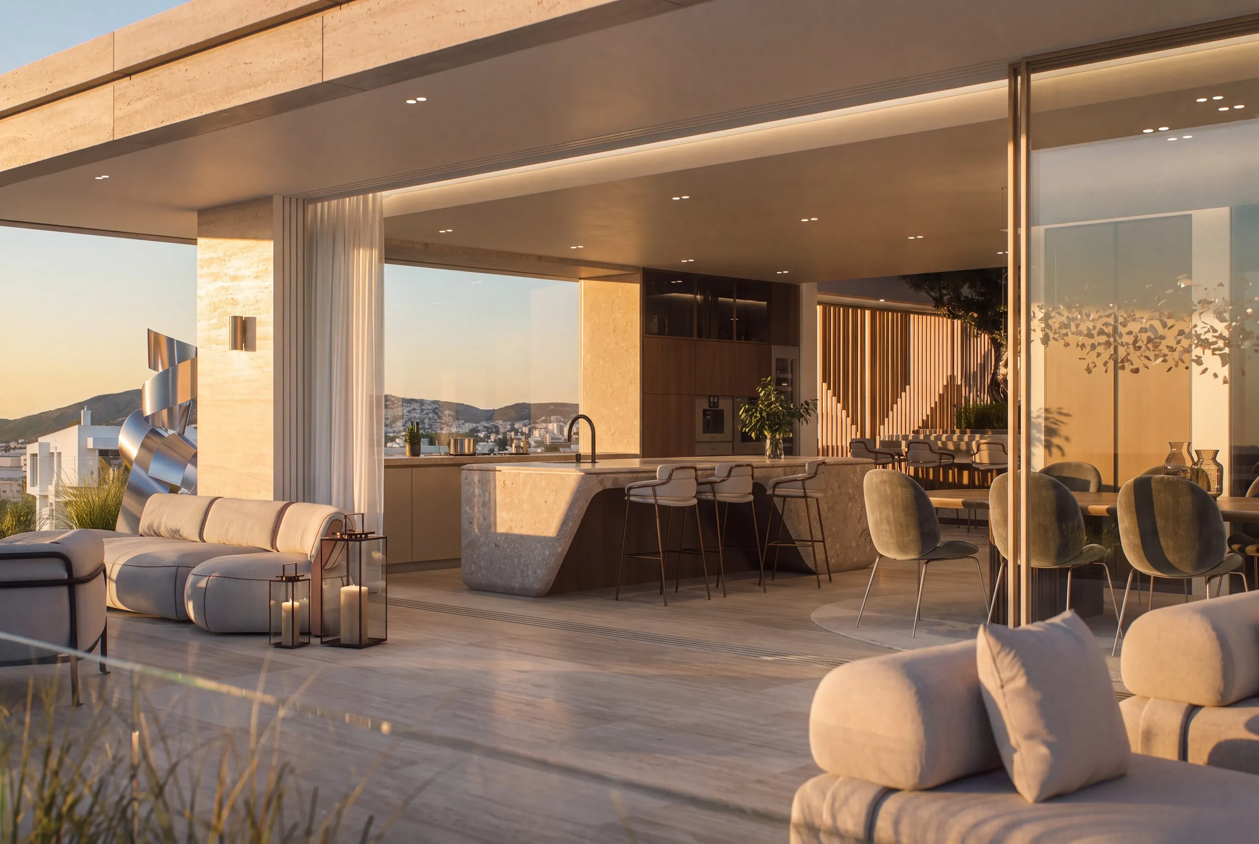 The Penthouse kitchen at sunset: the stone island, timber cabinetry and the terrace