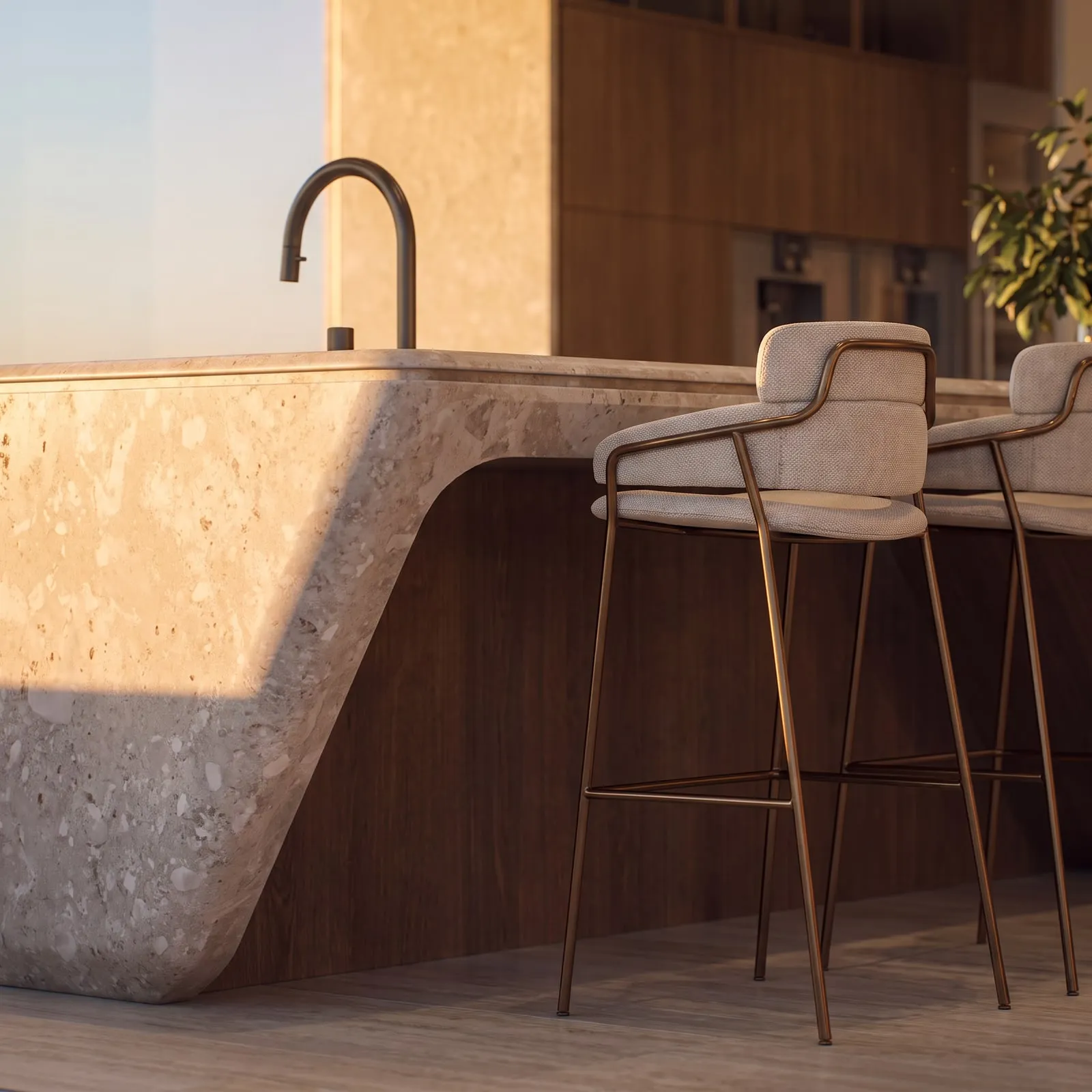 The Penthouse kitchen island, pale stone shaped into a sculptural form