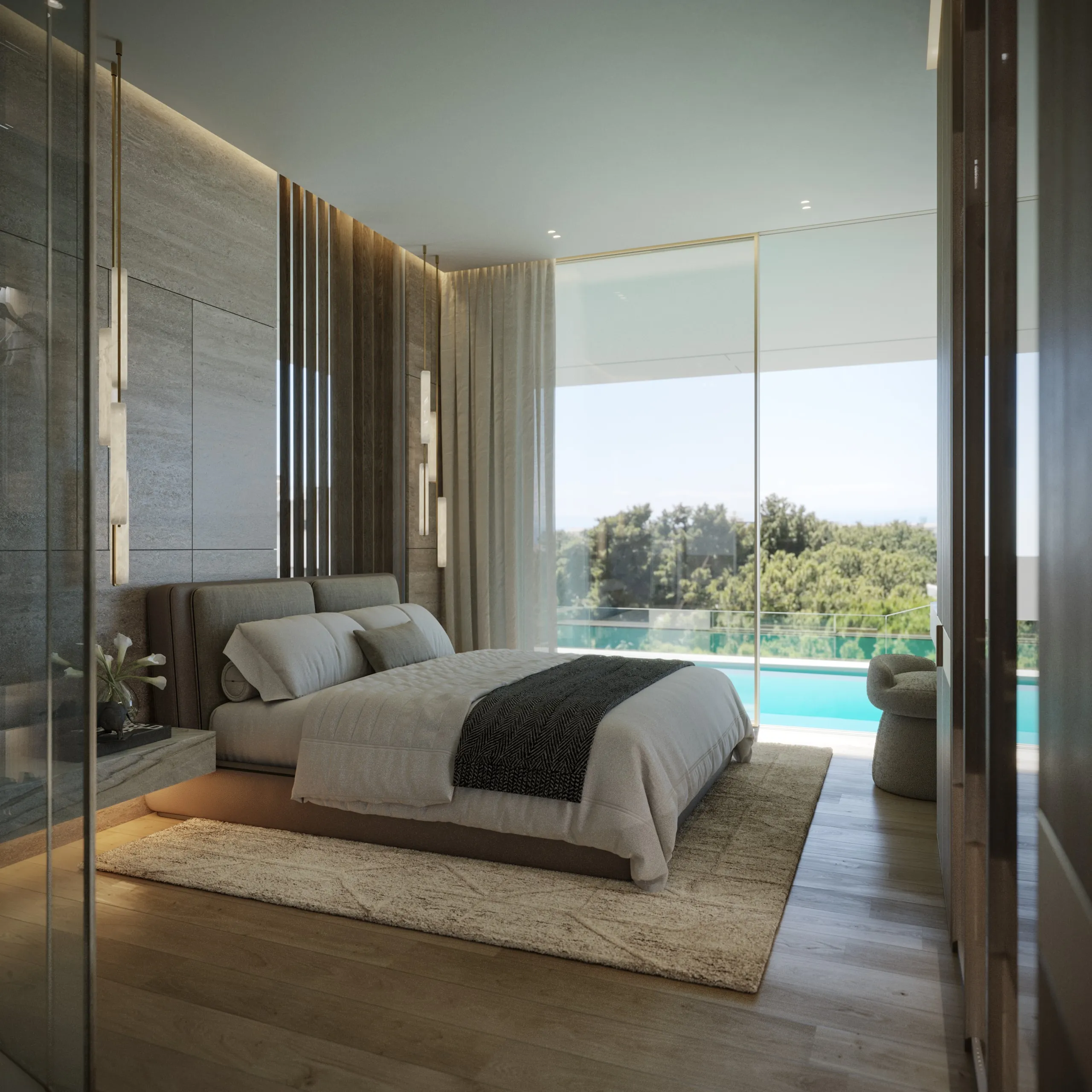 A Residence’s bedroom facing the glass, a pool and trees beyond