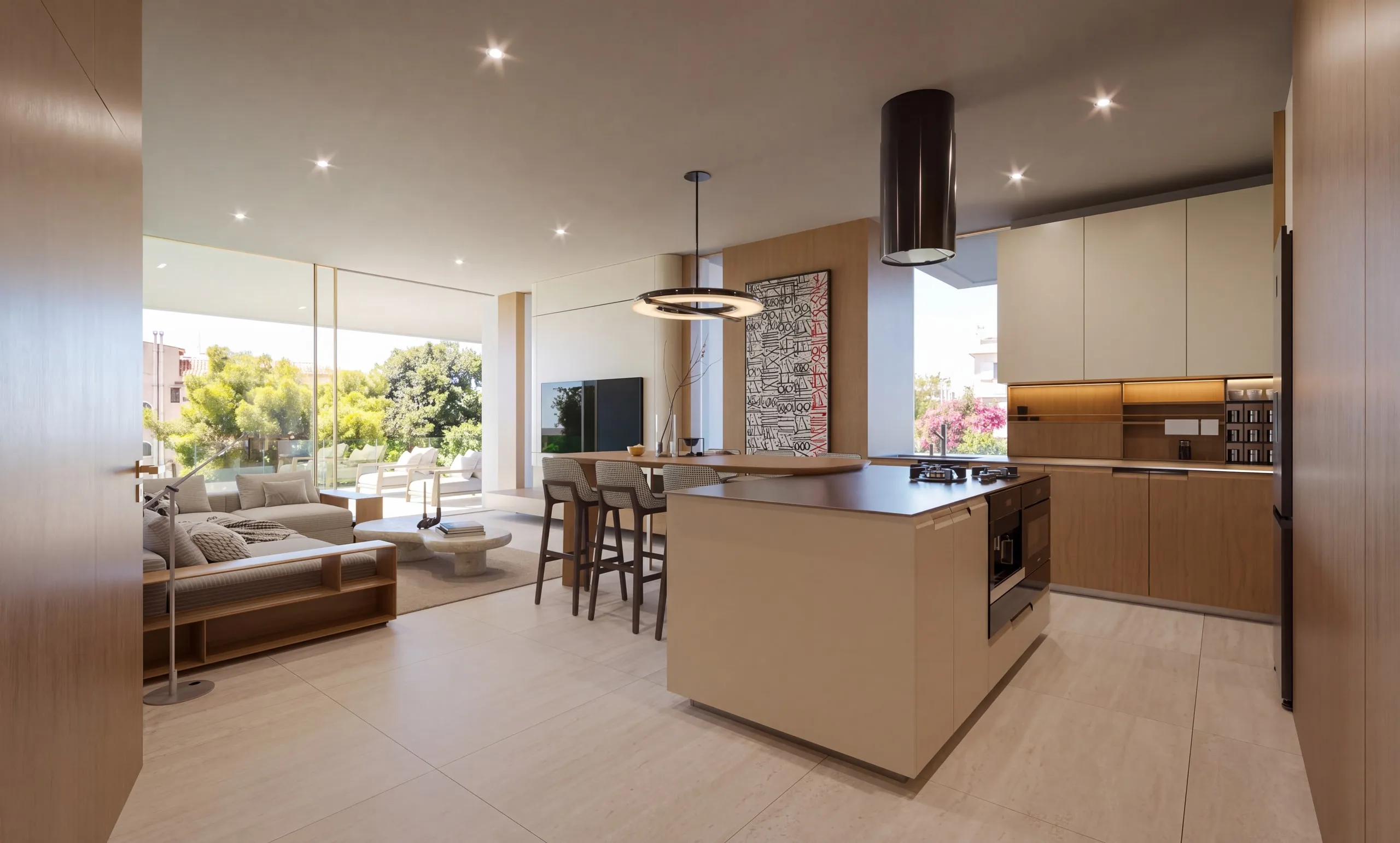 A Residence from the front door: the kitchen island, the living room and the balcony glass