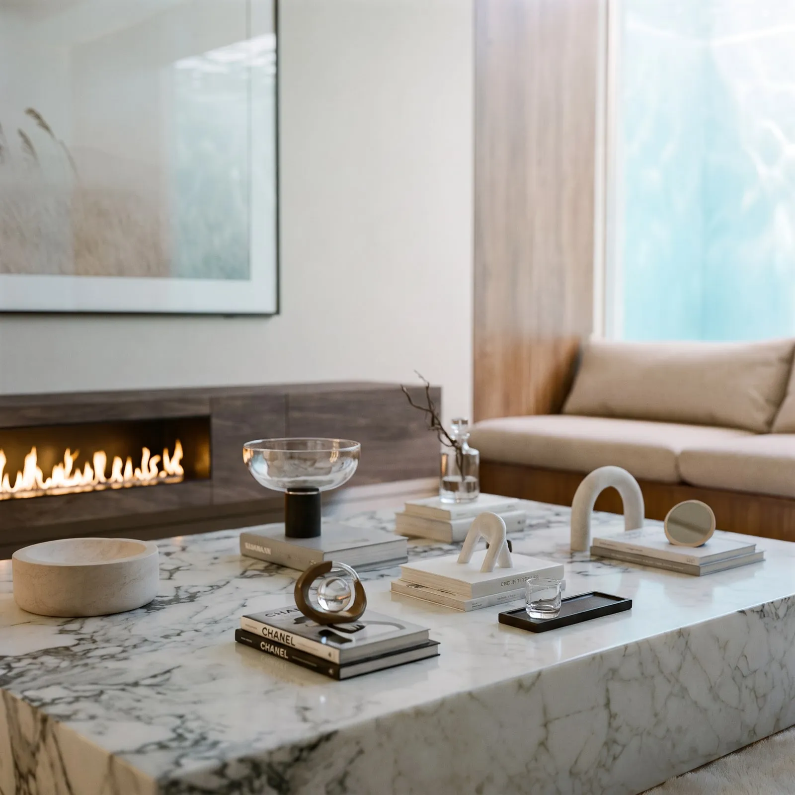 A low flame within veined stone, set for film nights.