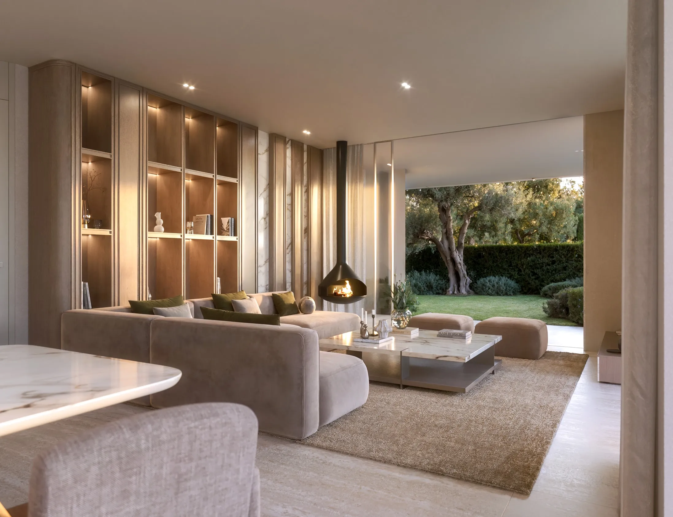 The Villa’s living room with its hanging fireplace, open to the garden
